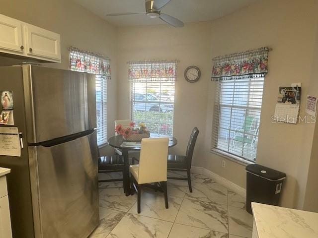 dining area with ceiling fan