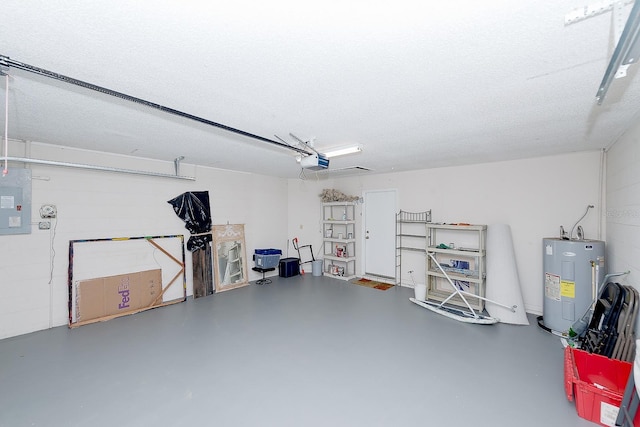 garage featuring a garage door opener, electric panel, and water heater