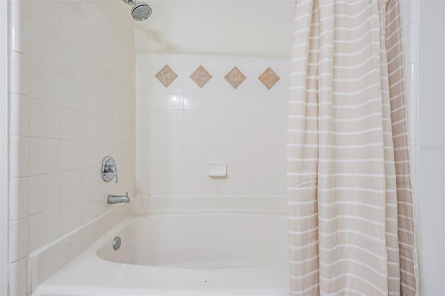 bathroom with shower / tub combo