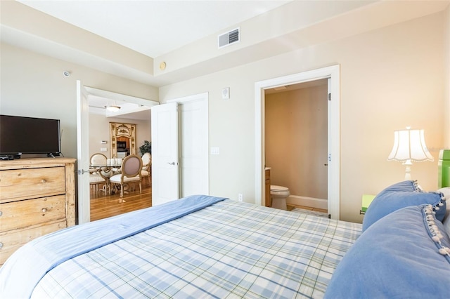 bedroom featuring ensuite bathroom