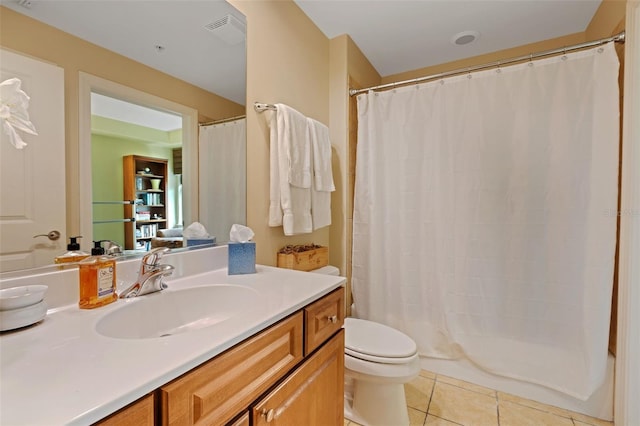 full bathroom with vanity, shower / tub combo, tile patterned floors, and toilet