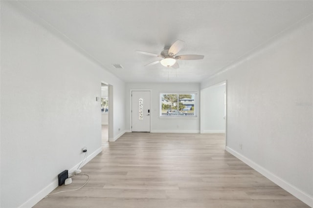 entryway featuring light hardwood / wood-style flooring and ceiling fan