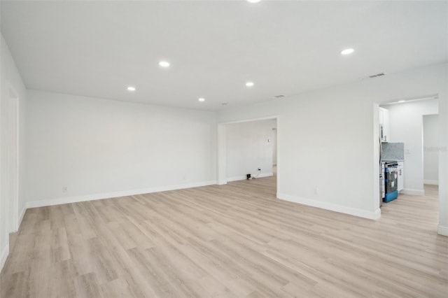 unfurnished room featuring light wood-type flooring