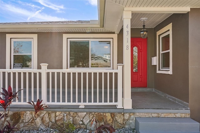 property entrance with a porch