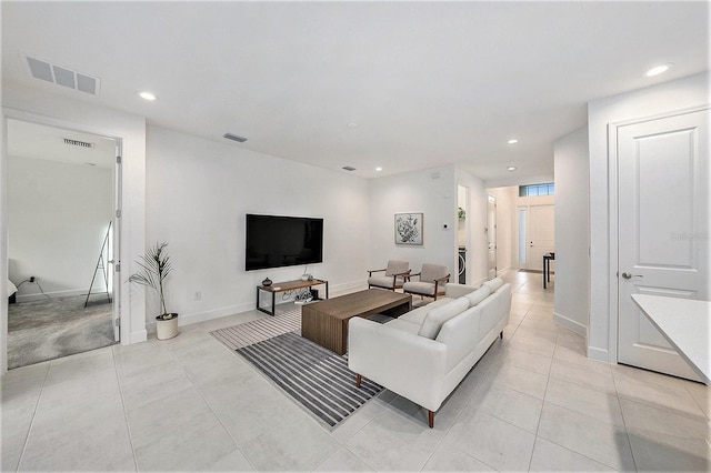 living room featuring light tile patterned flooring