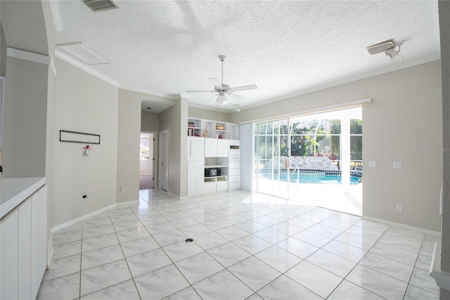 unfurnished living room with ceiling fan, ornamental molding, and a textured ceiling