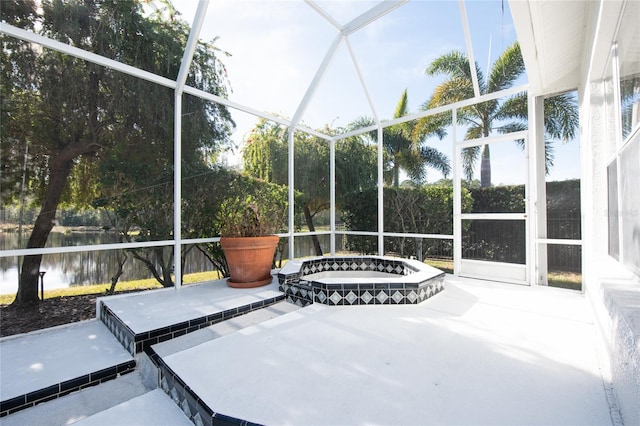 sunroom with a water view