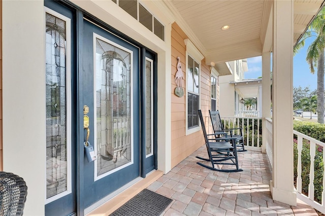 entrance to property with covered porch