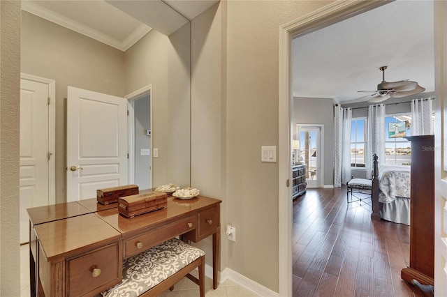 hall featuring hardwood / wood-style flooring and ornamental molding