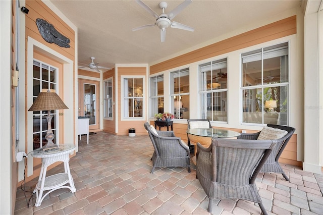 view of patio with ceiling fan