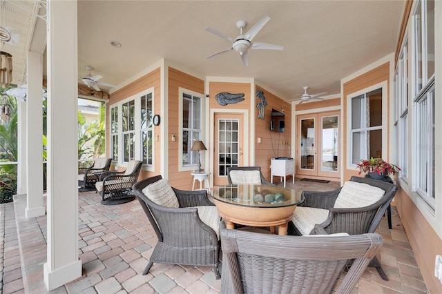 view of patio with ceiling fan and french doors