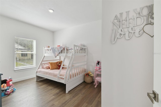 bedroom featuring dark wood-type flooring