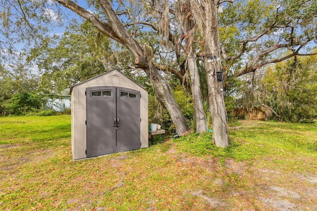 view of outdoor structure with a yard