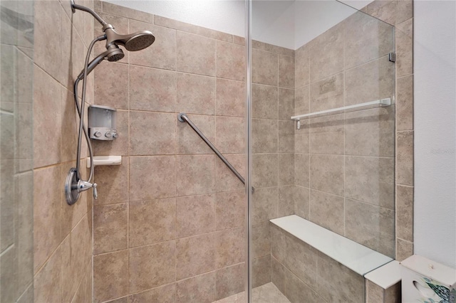 bathroom featuring tiled shower