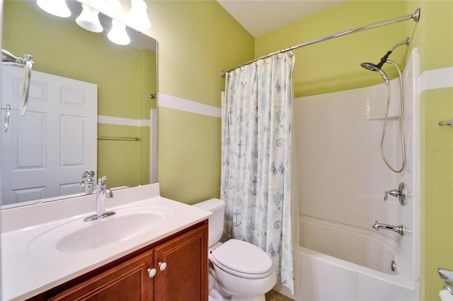 full bathroom featuring vanity, shower / tub combo, and toilet