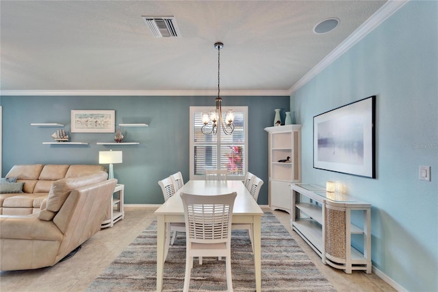 dining area with an inviting chandelier and ornamental molding