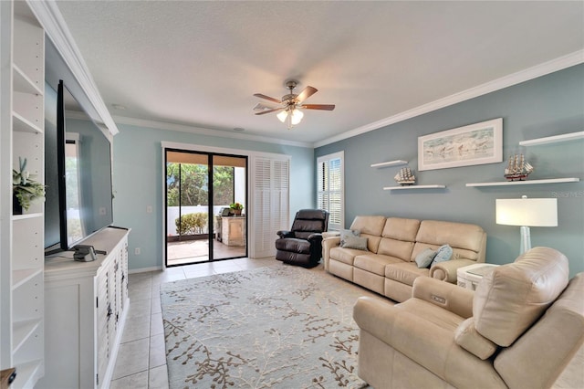 tiled living room featuring a textured ceiling, ornamental molding, and ceiling fan