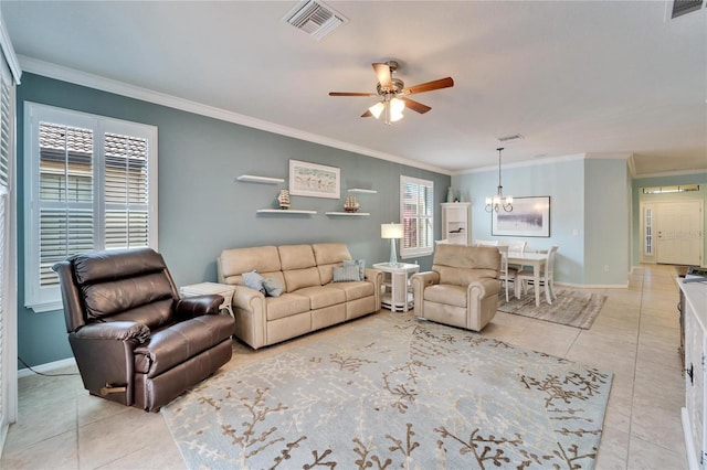 living room with crown molding, light tile patterned floors, and ceiling fan with notable chandelier