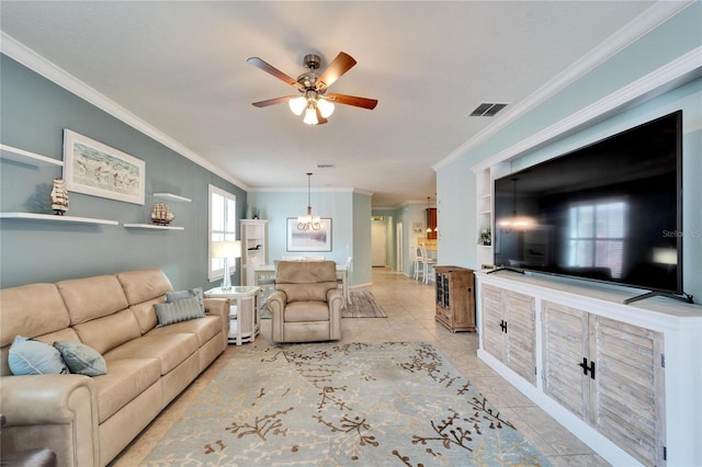 tiled living room featuring ceiling fan and ornamental molding