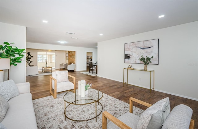 living room featuring dark hardwood / wood-style floors