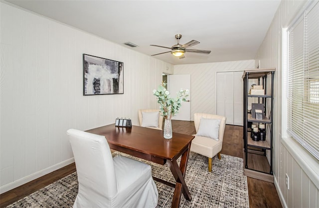 office space featuring dark hardwood / wood-style floors and ceiling fan