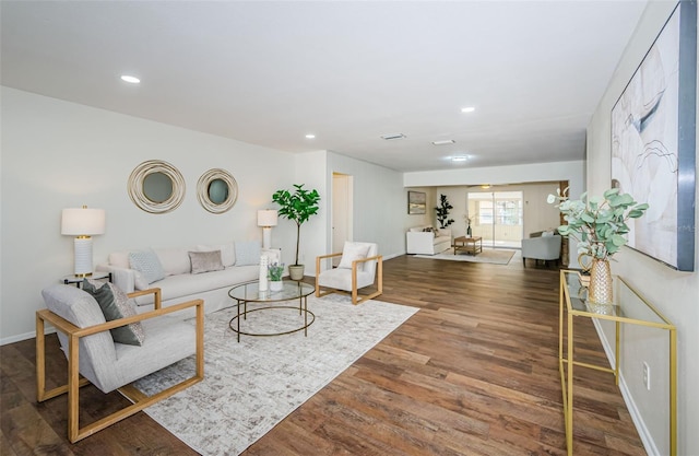 living room featuring dark hardwood / wood-style flooring