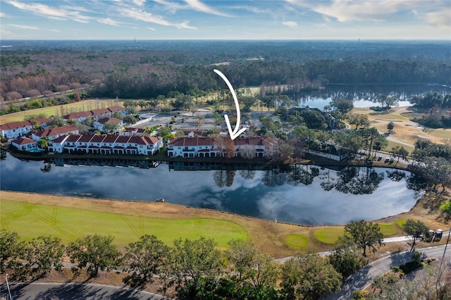 birds eye view of property featuring a water view