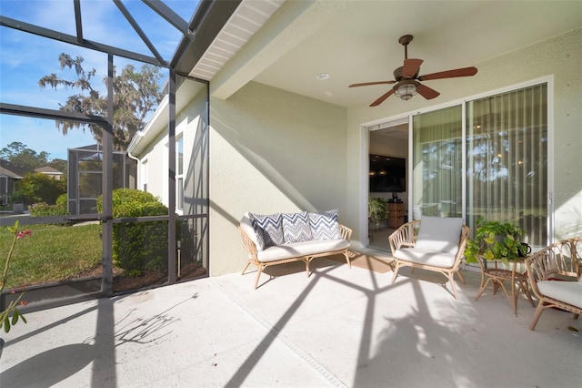 sunroom / solarium with ceiling fan