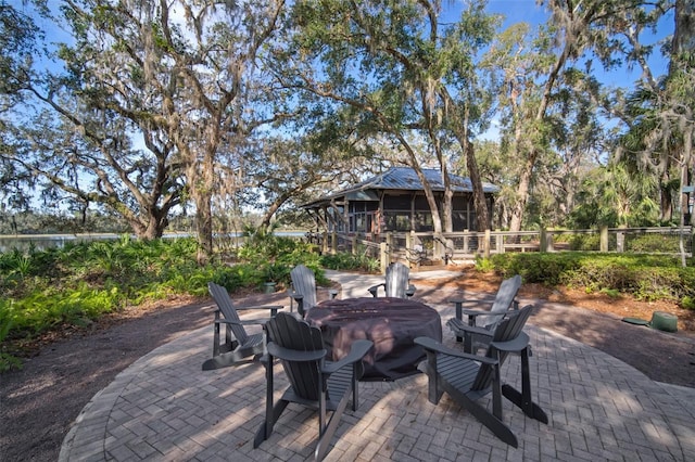 view of patio featuring a jacuzzi