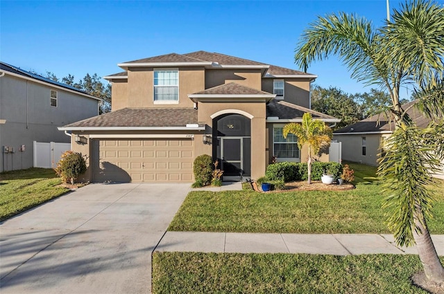 view of front of home with a garage, concrete driveway, a front lawn, and stucco siding