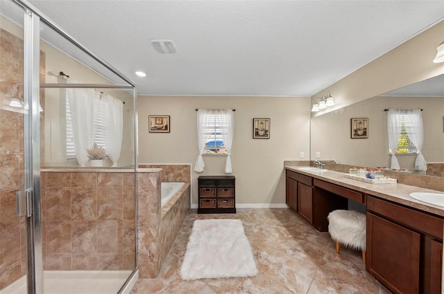 bathroom with vanity and plus walk in shower