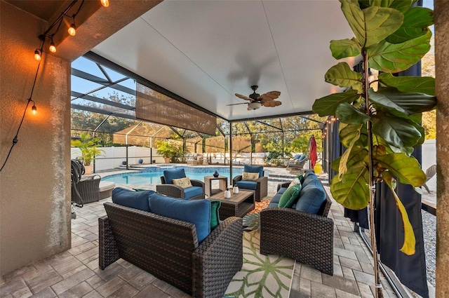 view of patio with ceiling fan, an outdoor hangout area, and a lanai