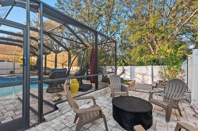 view of patio / terrace featuring a fenced in pool and a lanai