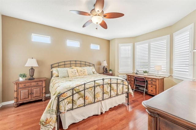 bedroom with wood-type flooring and ceiling fan