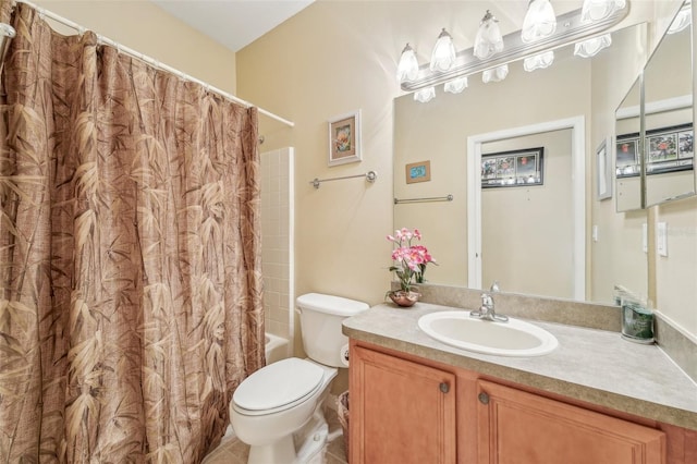 full bathroom featuring shower / tub combo, vanity, and toilet