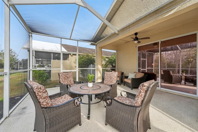 sunroom / solarium with ceiling fan