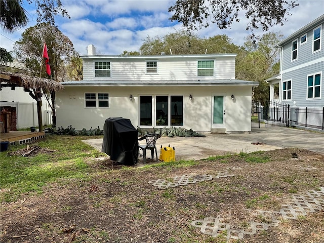 rear view of house featuring a patio area