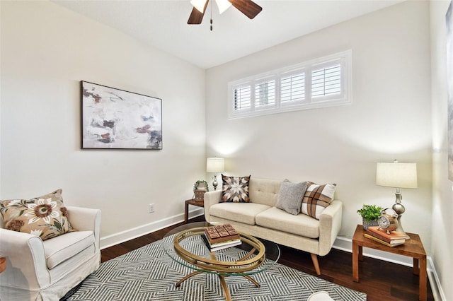 living room with hardwood / wood-style floors and ceiling fan