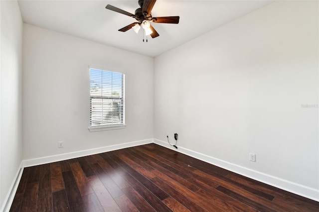 unfurnished room featuring ceiling fan and dark wood-type flooring