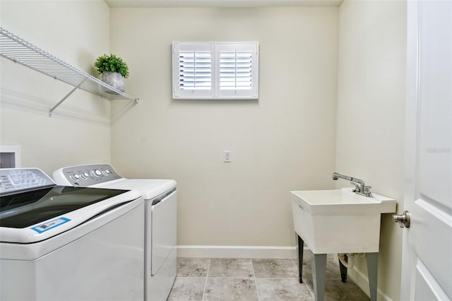 washroom with washer and dryer