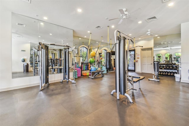 gym with ceiling fan and a healthy amount of sunlight