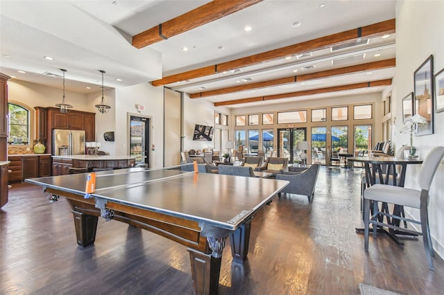 game room with billiards, dark hardwood / wood-style flooring, and beam ceiling