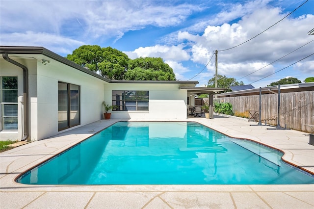 view of pool featuring a patio