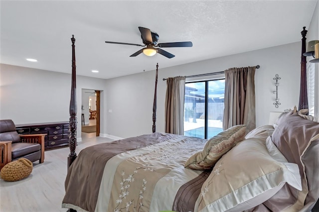 bedroom with access to outside and ceiling fan