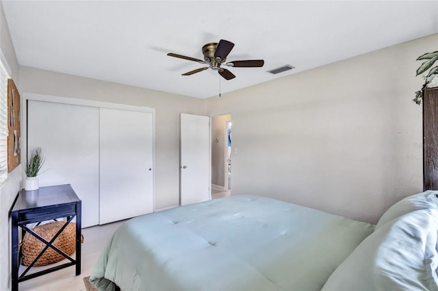 bedroom with a closet and ceiling fan