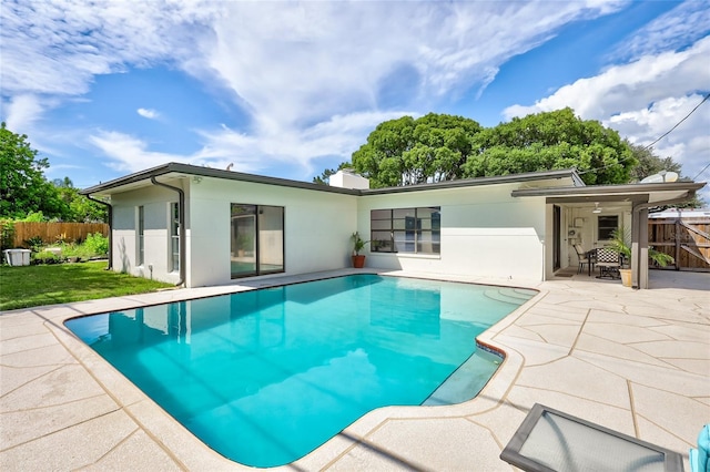 view of pool featuring a patio