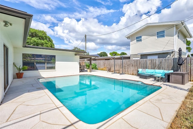 view of swimming pool featuring an outdoor hangout area and a patio area