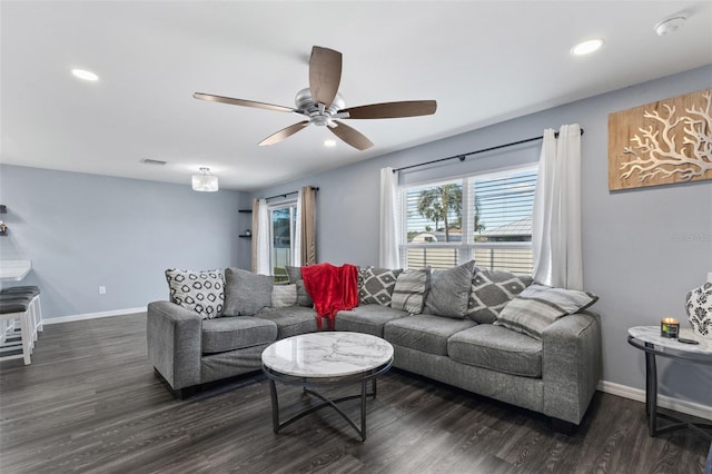 1203 Desmond St, Port Charlotte, FL 33952 - living area with dark wood-type flooring, recessed lighting, ceiling fan, and baseboards