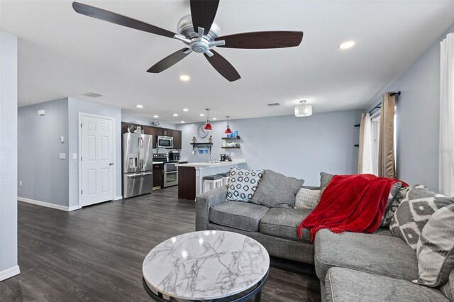 1203 Desmond St, Port Charlotte, FL 33952 - living area featuring recessed lighting, dark wood-type flooring, a ceiling fan, baseboards, and visible vents