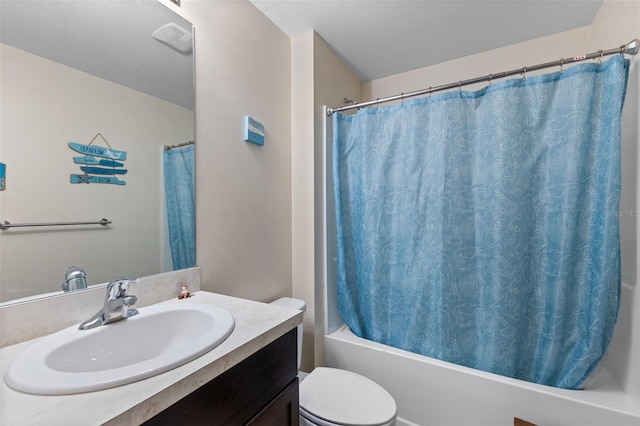 1203 Desmond St, Port Charlotte, FL 33952 - bathroom featuring toilet, shower / bath combo with shower curtain, and vanity